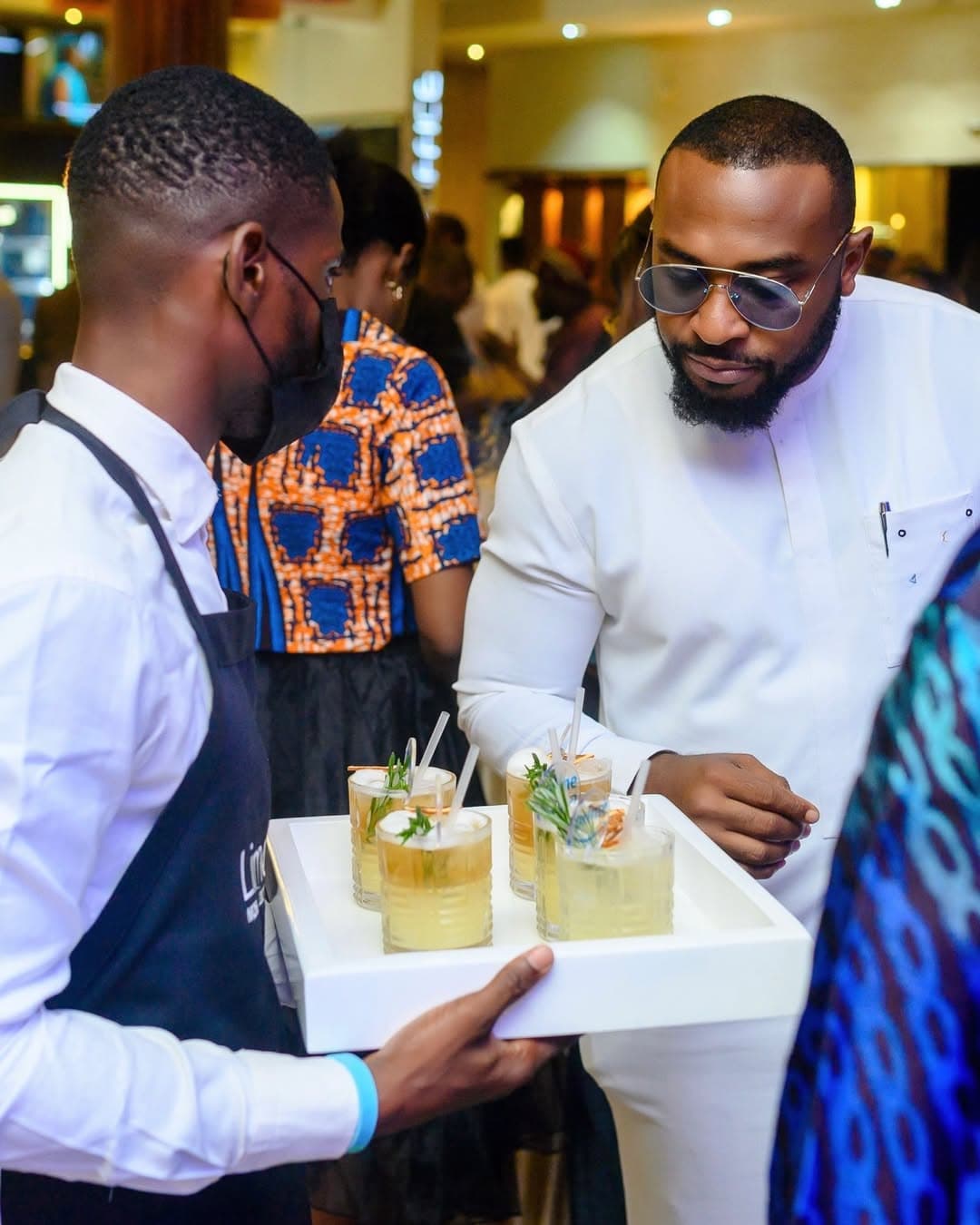 A Limehouse waiter serving a guest